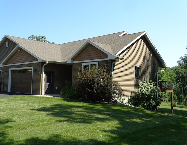 224 Country Ln, Durand, WI 54736 - single story home with a garage, a front lawn, roof with shingles, and asphalt driveway