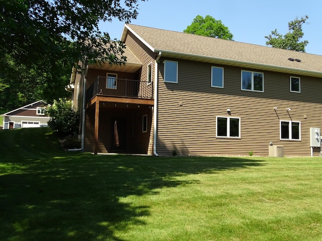 224 Country Ln, Durand, WI 54736 - back of property featuring a yard and a balcony