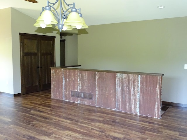 224 Country Ln, Durand, WI 54736 - unfurnished room with a chandelier and wood finished floors