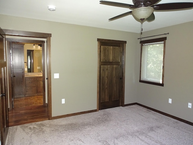 224 Country Ln, Durand, WI 54736 - unfurnished bedroom with carpet floors and ceiling fan