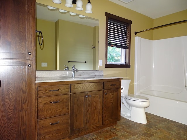 224 Country Ln, Durand, WI 54736 - bathroom with vanity, stone finish flooring, and  shower combination