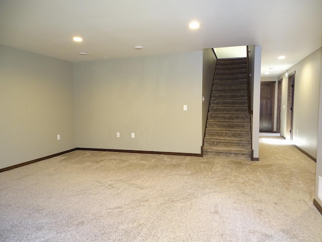 224 Country Ln, Durand, WI 54736 - empty room featuring light carpet, stairway, and recessed lighting