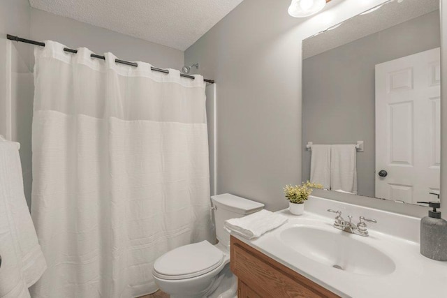 10695 184th Ave NW, Elk River, MN 55330 - full bathroom with a textured ceiling, vanity, and curtained shower