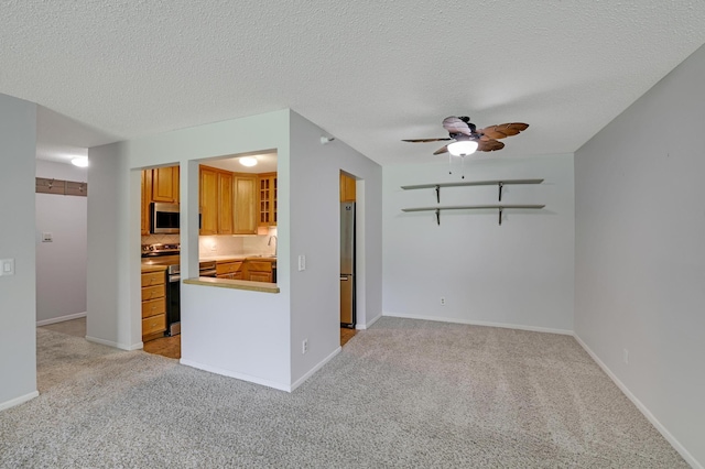 5643 Green Circle Dr Unit 107, Minnetonka, MN 55343 - unfurnished living room featuring ceiling fan, light carpet, and a textured ceiling