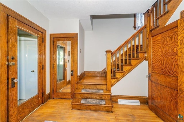 2014 5th St, Superior, WI 54880 - stairs featuring wood finished floors
