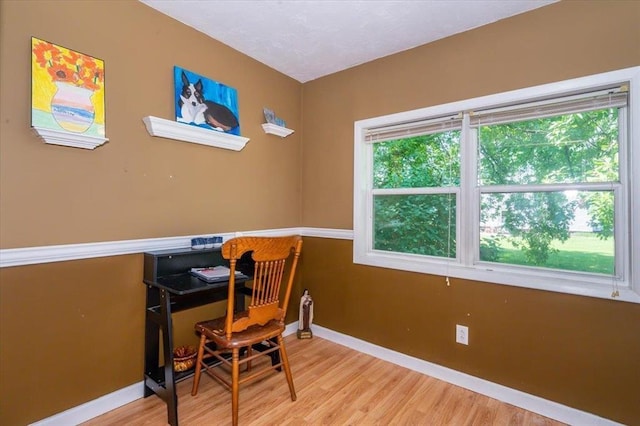 2014 5th St, Superior, WI 54880 - office with baseboards and wood finished floors