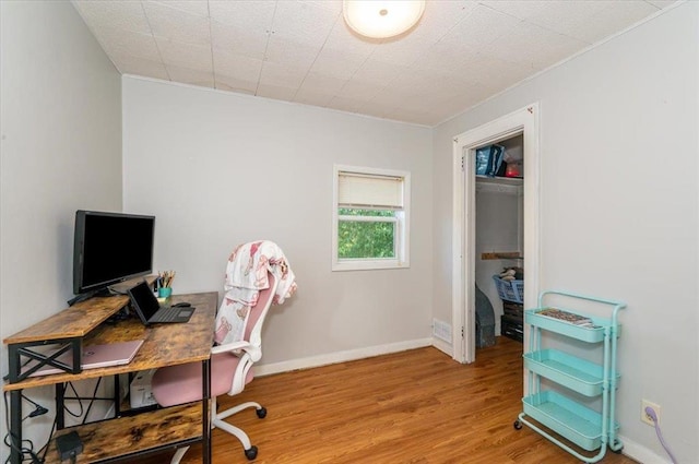 2014 5th St, Superior, WI 54880 - office featuring wood finished floors and baseboards