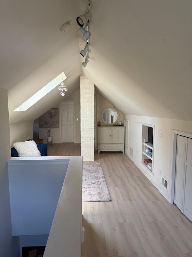2639 Arthur St NE, Minneapolis, MN 55418 - bonus room with a skylight, wood finished floors, lofted ceiling, and built in features