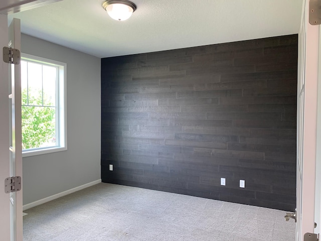 1248 100th Ave NW, Coon Rapids, MN 55433 - empty room featuring carpet and baseboards
