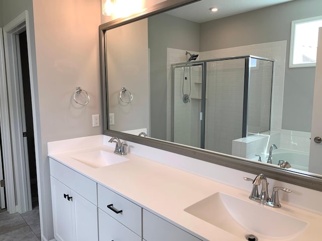 1248 100th Ave NW, Coon Rapids, MN 55433 - full bathroom featuring a stall shower, double vanity, and a bathtub