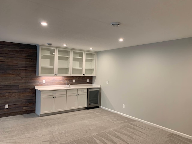 1248 100th Ave NW, Coon Rapids, MN 55433 - indoor wet bar with wine cooler, light carpet, decorative backsplash, and recessed lighting