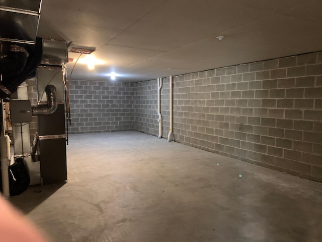 1248 100th Ave NW, Coon Rapids, MN 55433 - unfinished below grade area with concrete block wall and heating unit