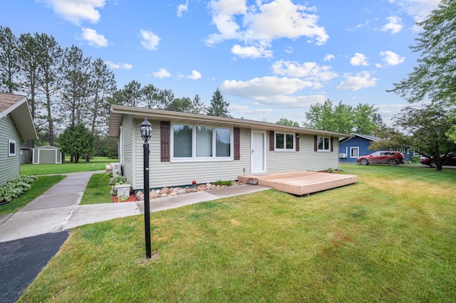 3661 Riley Rd, Rice Lake Twp, MN 55803 - view of front facade with a storage unit and a front lawn