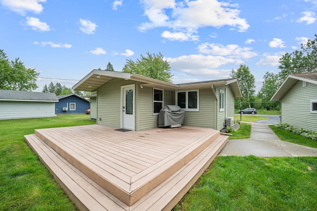 3661 Riley Rd, Rice Lake Twp, MN 55803 - wooden deck featuring a grill and a yard