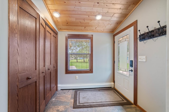 3661 Riley Rd, Rice Lake Twp, MN 55803 - entryway with wood ceiling, a baseboard heating unit, vaulted ceiling, and stone finish floors