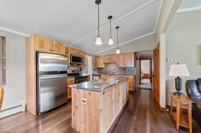 3661 Riley Rd, Rice Lake Twp, MN 55803 - kitchen featuring appliances with stainless steel finishes, dark countertops, light brown cabinets, decorative backsplash, and a center island