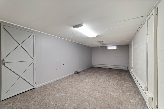 3661 Riley Rd, Rice Lake Twp, MN 55803 - below grade area with a baseboard heating unit, carpet, and a baseboard radiator
