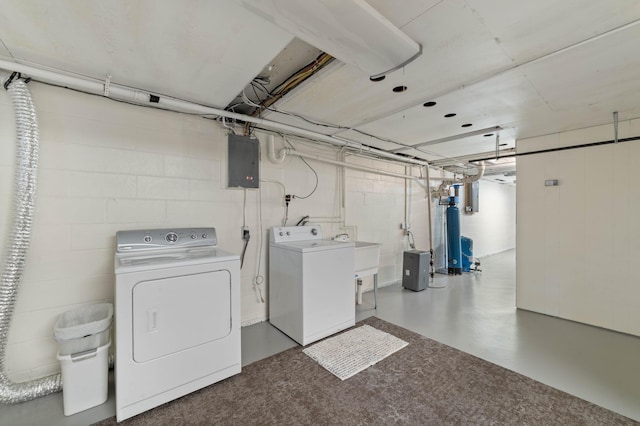 3661 Riley Rd, Rice Lake Twp, MN 55803 - laundry room featuring independent washer and dryer, electric panel, and concrete block wall