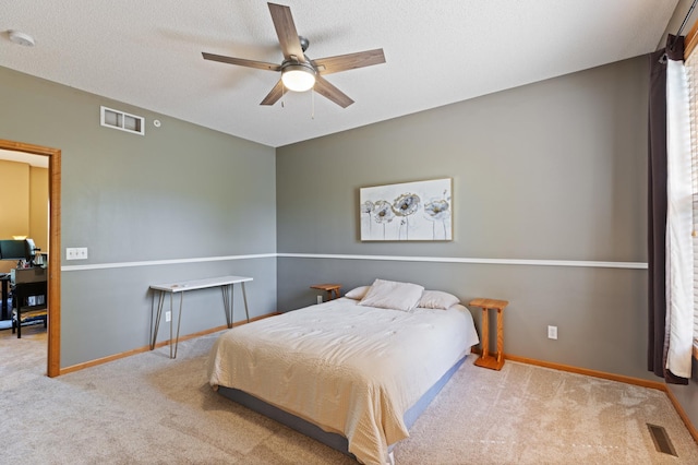 9605 Scott Cir N, Brooklyn Park, MN 55443 - carpeted bedroom with a ceiling fan and a textured ceiling