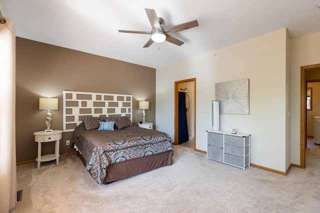 9605 Scott Cir N, Brooklyn Park, MN 55443 - carpeted bedroom featuring a walk in closet and a ceiling fan