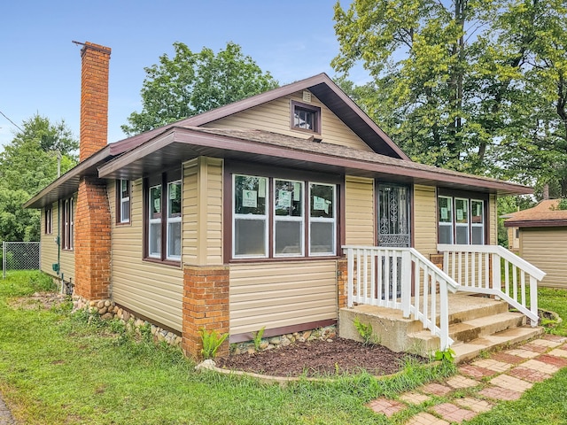 30867 Rasmussen Rd, Pequot Lakes, MN 56472 - bungalow-style home featuring a chimney