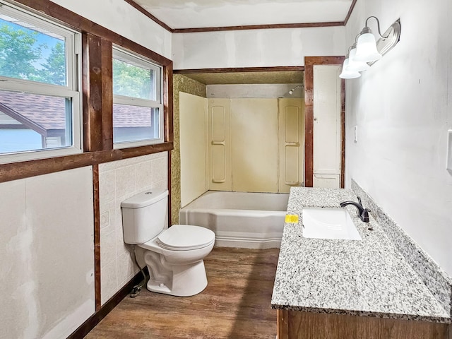 30867 Rasmussen Rd, Pequot Lakes, MN 56472 - full bathroom featuring vanity, wood finished floors, ornamental molding, and shower / bathtub combination