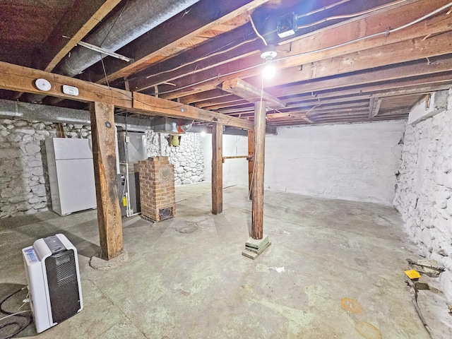 30867 Rasmussen Rd, Pequot Lakes, MN 56472 - unfinished basement with freestanding refrigerator