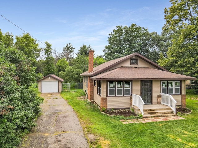 30867 Rasmussen Rd, Pequot Lakes, MN 56472 - bungalow with a garage, an outdoor structure, a chimney, asphalt driveway, and roof with shingles