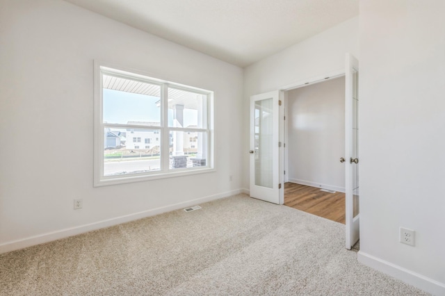 2550 Downing Ave, Shakopee, MN 55379 - unfurnished room with carpet floors and french doors