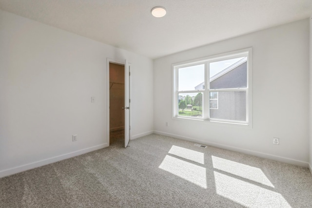 2550 Downing Ave, Shakopee, MN 55379 - unfurnished room featuring light carpet and baseboards