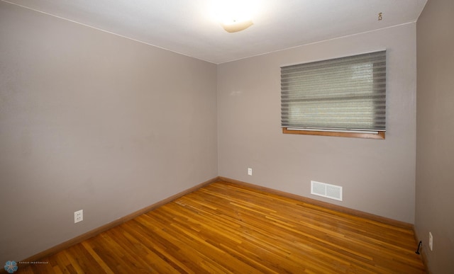 2510 10th St N, Fargo, ND 58102 - unfurnished room with wood finished floors and baseboards
