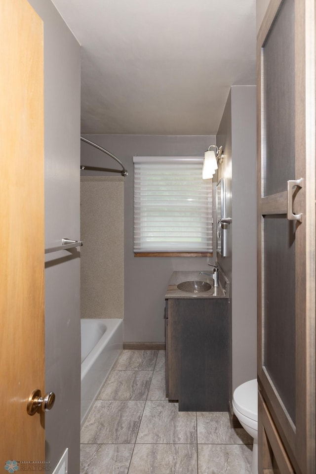 2510 10th St N, Fargo, ND 58102 - full bath with vanity, bathing tub / shower combination, and tile patterned floors