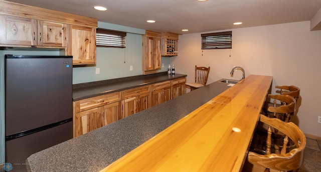 2510 10th St N, Fargo, ND 58102 - indoor wet bar featuring freestanding refrigerator and recessed lighting