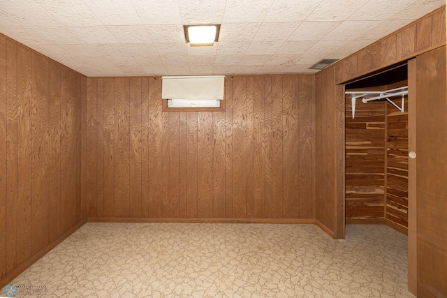 2510 10th St N, Fargo, ND 58102 - finished basement featuring wooden walls and light flooring
