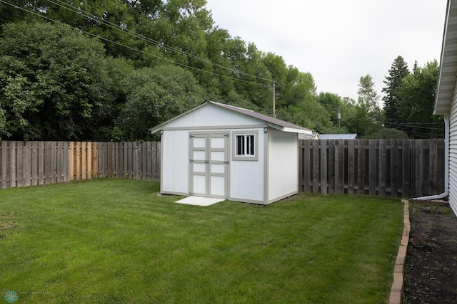 2510 10th St N, Fargo, ND 58102 - view of shed with a fenced backyard
