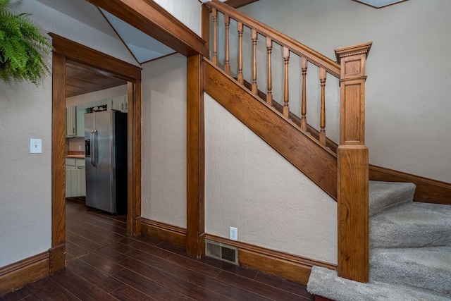 433 S Ave, North Mankato, MN 56003 - staircase featuring wood finished floors and a textured wall