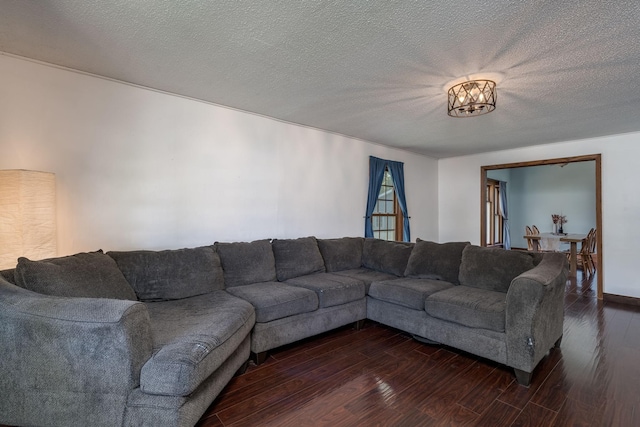 433 S Ave, North Mankato, MN 56003 - living area featuring dark wood-type flooring and a textured ceiling
