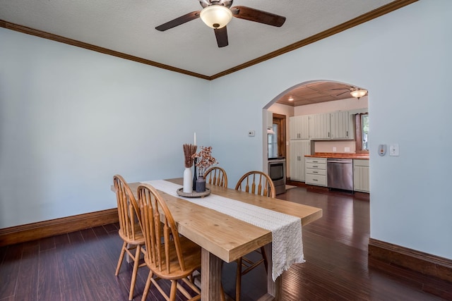 433 S Ave, North Mankato, MN 56003 - dining area with arched walkways, a ceiling fan, dark wood-type flooring, crown molding, and a textured ceiling