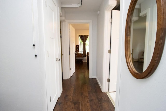 1109 Adams St, Mankato, MN 56001 - hall featuring dark wood-style flooring and baseboards