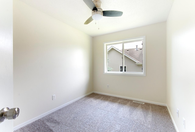 775 Leon St, Jordan, MN 55352 - carpeted spare room with ceiling fan and baseboards