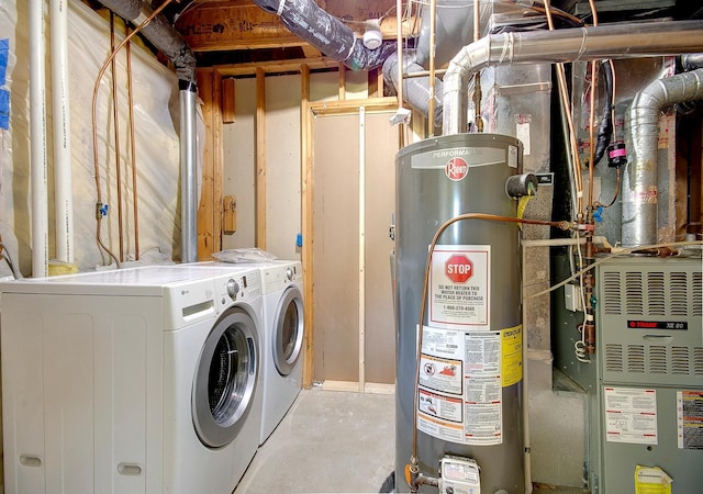 775 Leon St, Jordan, MN 55352 - laundry room featuring gas water heater, separate washer and dryer, and heating unit