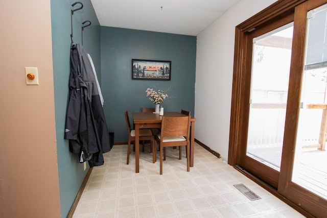 624 Garfield Ave, North Mankato, MN 56003 - dining space featuring plenty of natural light and light floors