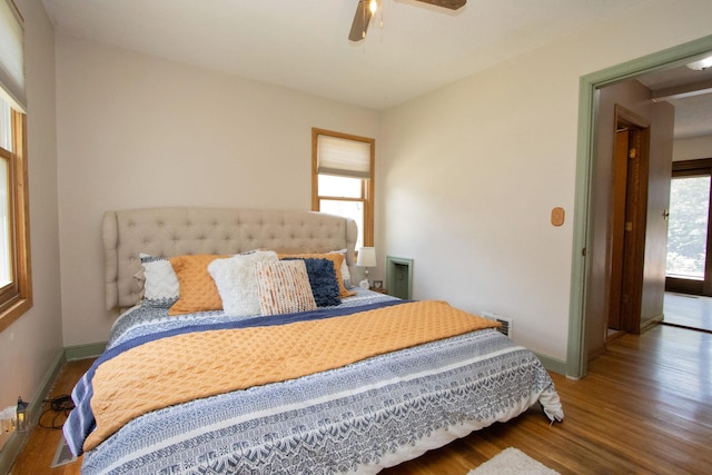 624 Garfield Ave, North Mankato, MN 56003 - bedroom featuring wood finished floors and ceiling fan