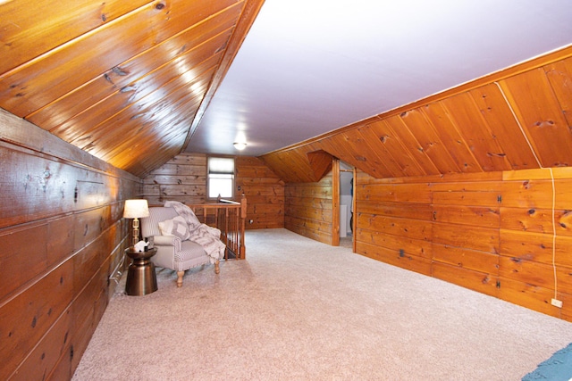 624 Garfield Ave, North Mankato, MN 56003 - living area with wooden walls, vaulted ceiling, carpet flooring, and wood ceiling