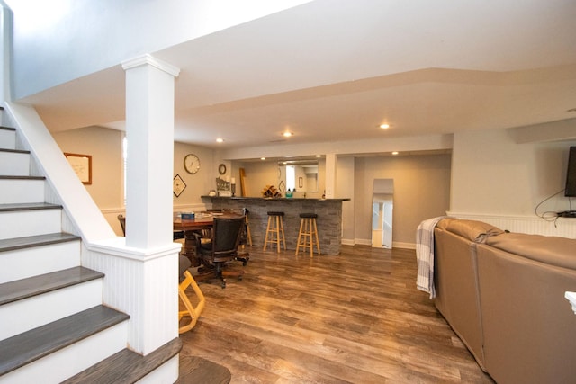 624 Garfield Ave, North Mankato, MN 56003 - living area with stairway, bar, recessed lighting, and wood finished floors