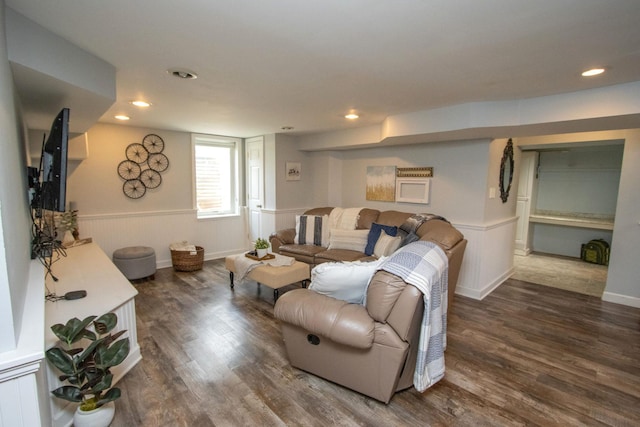 624 Garfield Ave, North Mankato, MN 56003 - living area with wood finished floors, a wainscoted wall, and recessed lighting
