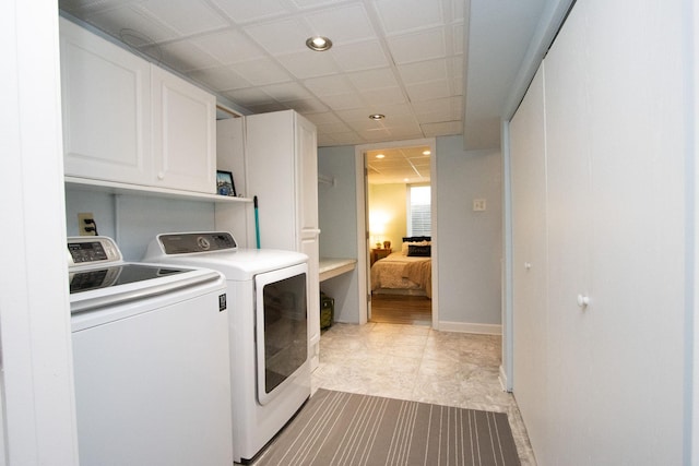 624 Garfield Ave, North Mankato, MN 56003 - laundry room featuring washing machine and dryer, cabinet space, and recessed lighting