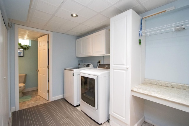 624 Garfield Ave, North Mankato, MN 56003 - washroom with cabinet space, washing machine and dryer, and recessed lighting