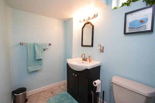 624 Garfield Ave, North Mankato, MN 56003 - bathroom featuring vanity and toilet