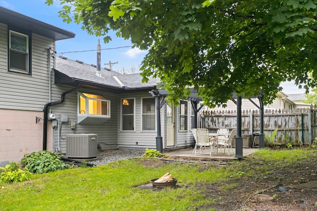 117 Division St, Mankato, MN 56001 - back of house with a patio and roof with shingles